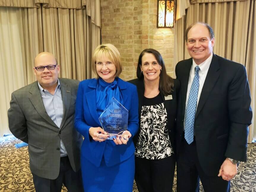 Catherine Monson receives the award for 2018 Top Female Executive